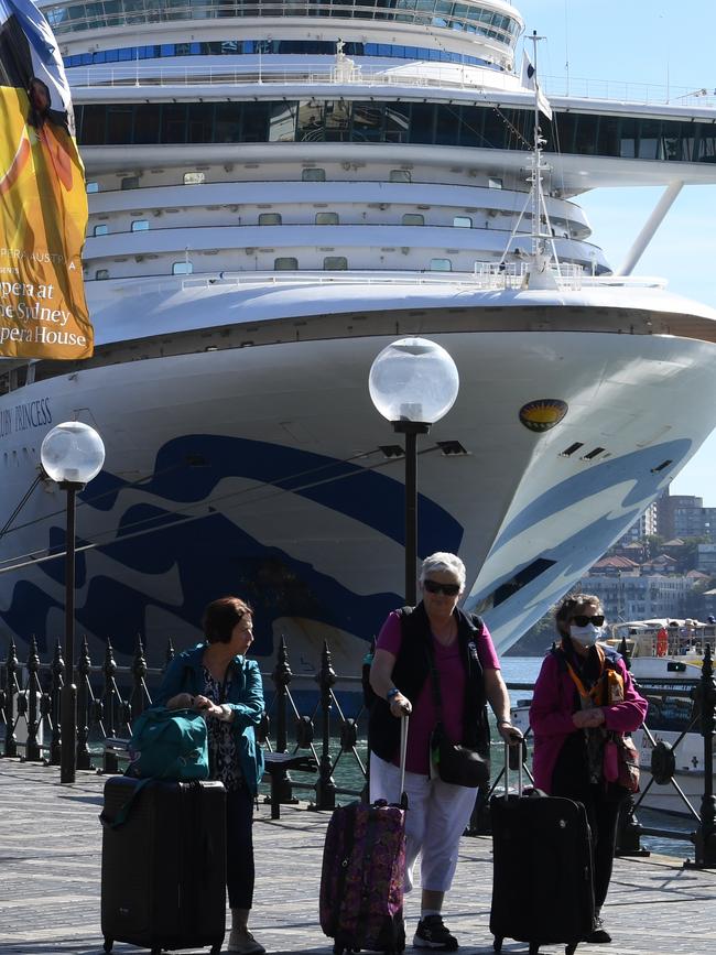 Cruise ship passengers disembark from the Ruby Princess in Sydney on Thursday. Picture: AAP