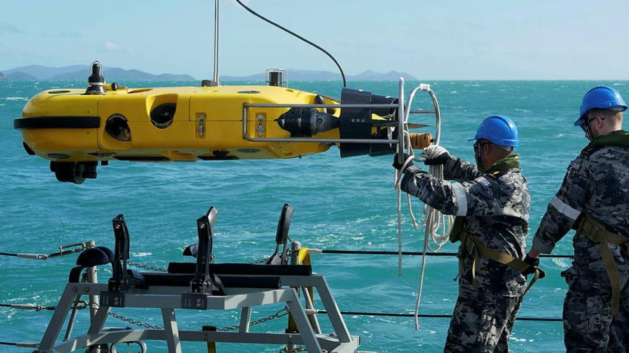 Royal Australian Navy sailors from HMAS Huon conduct search operations in the vicinity of Lindeman Island. Picture contributed