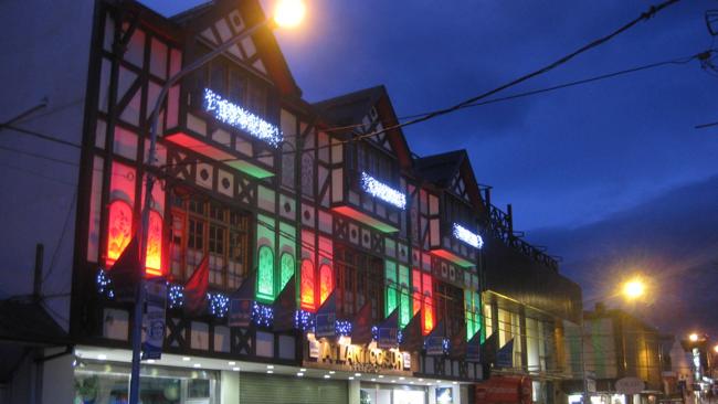 Shops selling outdoor wear line Ushuaia's main street. Picture: Brad Crouch.