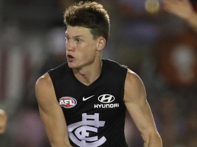 Sam Walsh in action for Carlton during the AFL JLT Community Series pre-season match between the Carlton Blues and the Essendon Bombers at Ikon Park in Melbourne, Thursday, February 28, 2019. (AAP Image/David Crosling) NO ARCHIVING, EDITORIAL USE ONLY