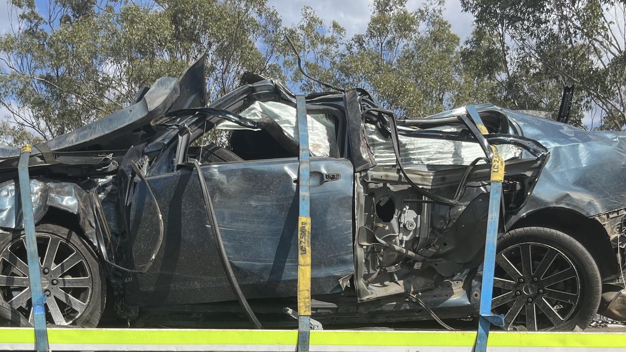 Police said the blue 2010 Holden Commodore ran off the highway about 10am and crashed into trees before overturning.