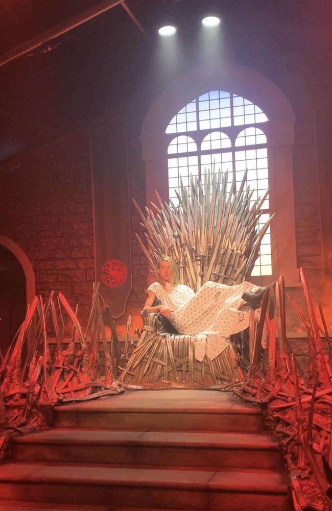 Christian Targaryen/Wilkins setting up camp on the Iron Throne at San Diego Comic-Con.