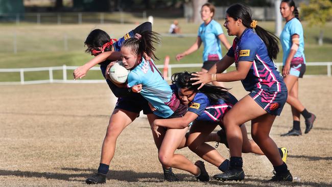 Keebra Park half Skye Raftstrand-Smith tackled by Mabel Park defence. Picture Glenn Hampson