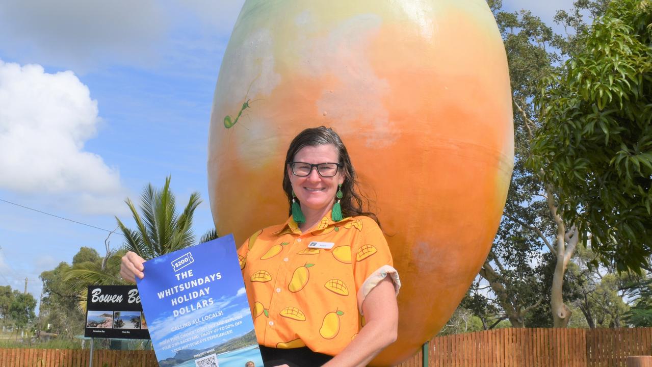 Sales assistant Mary Gallagher at Bowen's visitor information centre has been inundated with inquiries on the first day of the scheme. Picture: Kirra Grimes.