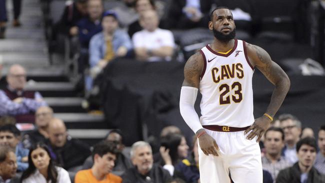 Cleveland Cavaliers forward LeBron James reacts during a break in play.