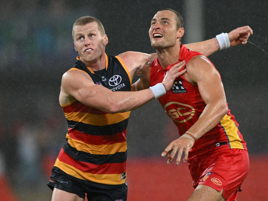 Suns co-captain Jarrod Witts (right) has extended his Gold Coast contract. Picture: Matt Roberts/AFL Photos/via Getty Images