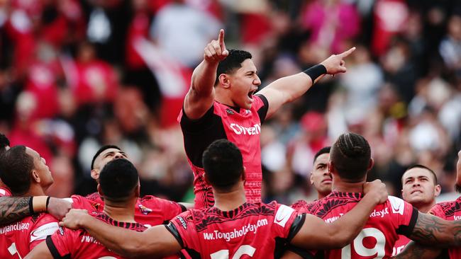 Jason Taumalolo of Tonga leads the Sipi Tau against the Kiwis.