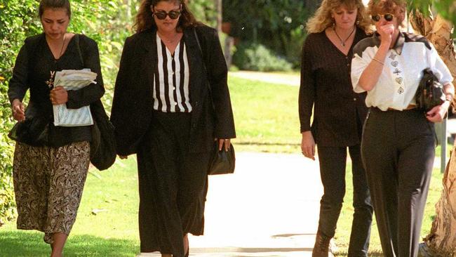 Family of Qld murder victim, Patricia Leedie, attending court, mother in striped blouse and sunglasses.