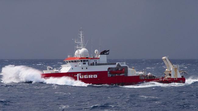 Saying goodbye. Fugro Discovery encountering rough seas during its search for MH370. Picture: ATSB