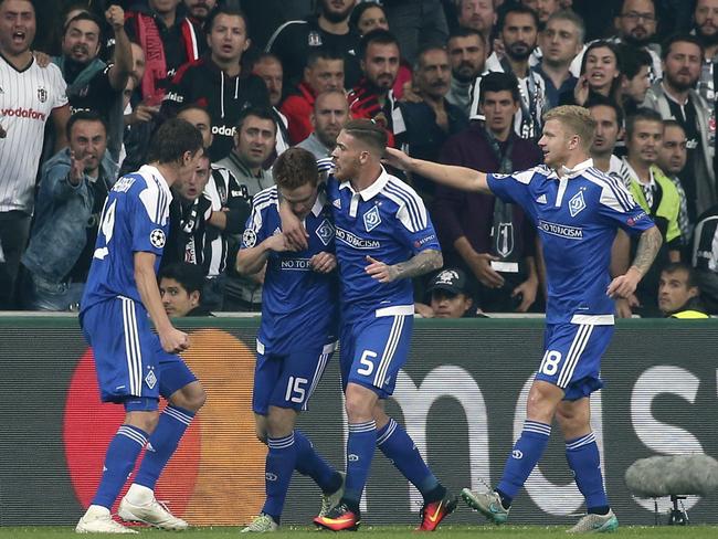 Dynamo Kiev's Viktor Tsygankov, second left, celebrates with his teammates.