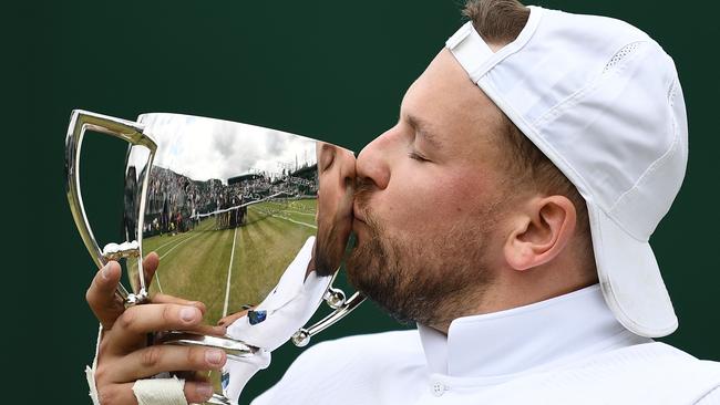 Dylan Alcott celebrates winning the quad wheelchair singles final at Wimbledon. Picture: Daniel Leal-Olivas/AFP