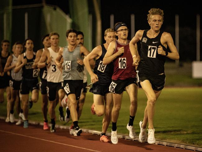 Ipswich athlete Jude Thomas leads the pack on his way to smashing a state under-20 record in the Queensland 3km open championships race. Picture: Michael Thomas