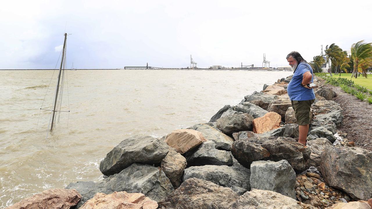 Douglas Bremner inspects his boat near the marina in Townsville. Picture: Adam Head