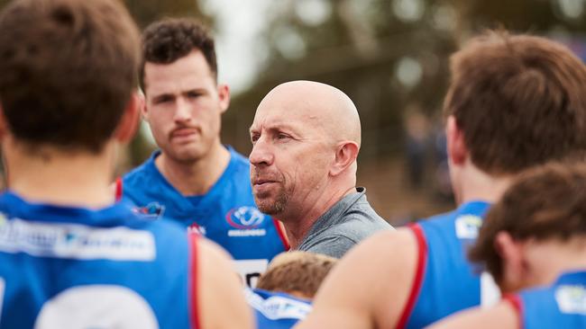 Central coach Roy Laird addresses his troops in a match against the Eagles at Elizabeth in May. Picture: MATT LOXTON