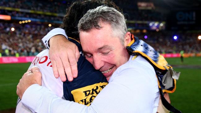 Cowboys coach Paul Green hugs Johnathan Thurston after the north Queensland team won the 2015 NRL grand final. Picture: Getty Images