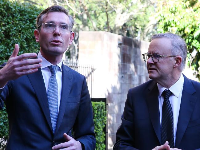 SYDNEY, AUSTRALIA - NEWSWIRE Photos - September 14, 2022: NSW Premier Dominic Perrottet and Prime Minister Anthony Albanese are seen chatting ahead of a press conference in Sydney. Picture: NCA Newswire/Gaye Gerard