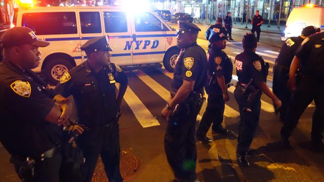 Police block a road after the explosion. Picture: AFP/ William Edwards