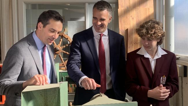 Minister for Education, Training and Skills Blair Boyer with Premier Peter Malinauskas and a Findon High School student. Picture: Kitty Barr