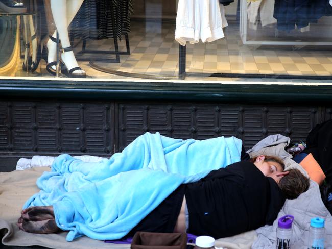 A couple camped outside the QVB on Tuesday morning. Picture: John Grainger