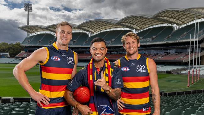 Crows captain Jordan Dawson and Rory Sloane with Guy Sebastian. Picture: Sarah Reed Photography