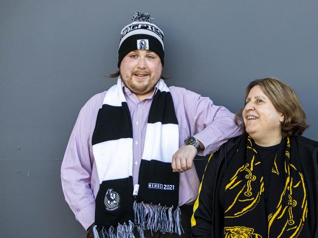 30/06/2021 Collingwood fan Sam Colley with Richmond supporter Nadia Mattiazzo who are both blind and use the radio to consume their sports.. Aaron Francis/The Australian