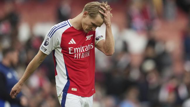 Arsenal's Martin Odegaard leaves the field at the end of the English Premier League soccer match between Arsenal and Bournemouth at Emirates stadium in London, Saturday, May 3, 2025. (AP Photo/Kin Cheung)