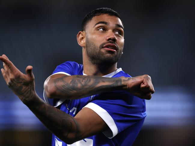 MELBOURNE, AUSTRALIA - AUGUST 12: Tarryn Thomas of the Kangaroos warms up before the round 22 AFL match between North Melbourne Kangaroos and Essendon Bombers at Marvel Stadium, on August 12, 2023, in Melbourne, Australia. (Photo by Darrian Traynor/Getty Images)