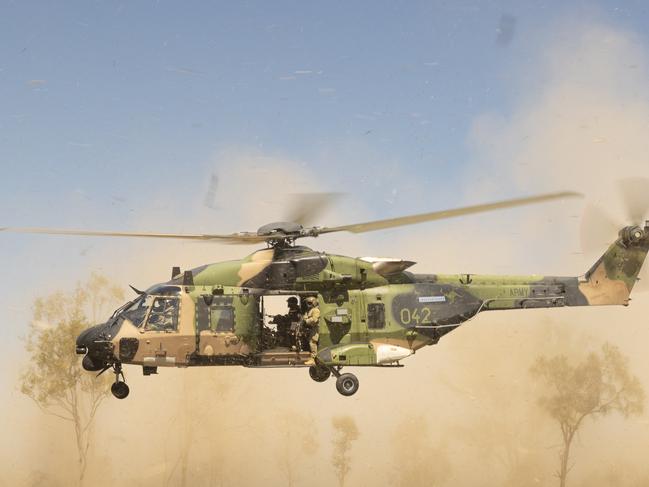 An Australian Army MRH-90 Taipan from the 5th Aviation Regiment lands as part of air mobility operations with the 3rd Battalion, The Royal Australian Regiment on Exercise Brolga Run 23 at Townsville Field Training Area, Townsville, Queensland. *** Local Caption *** The Australian Army’s 3rd Brigade deployed to the Townsville Field Training Area to conduct their second major training exercise for 2023, Exercise Brolga Run from 27th of April – 19th of May. Over 1500 Townsville-based troops were put to the test on how to conduct stability, security, and evacuation operations against a simulated enemy. Exercise Brolga Run is the second of several training activities for 2023, as the 3rd Brigade prepares for Exercise Talisman Sabre with the US military and other partner forces later in the year.