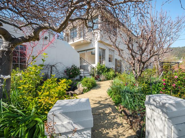 Peek through the gardens at No.5 Ellington Road, Sandy Bay.