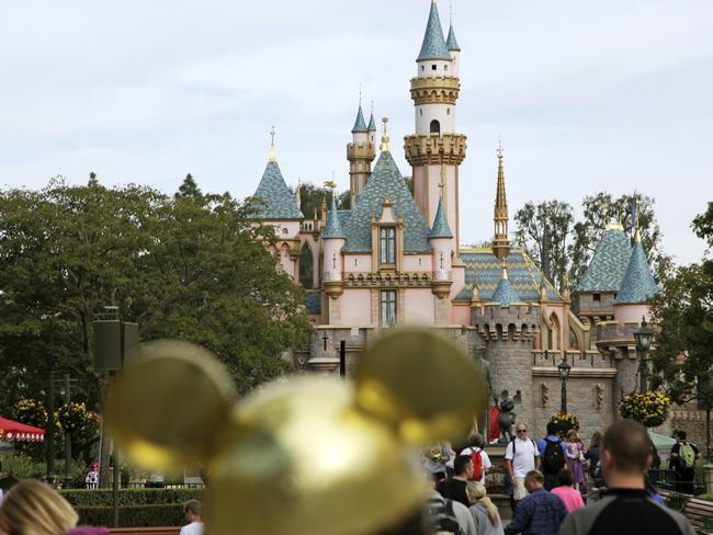 Sleeping Beauty's Castle in the background at Disneyland Resort in Anaheim, California. Disneyland says it's closing its California parks starting Saturday over coronavirus concerns. Picture: AP