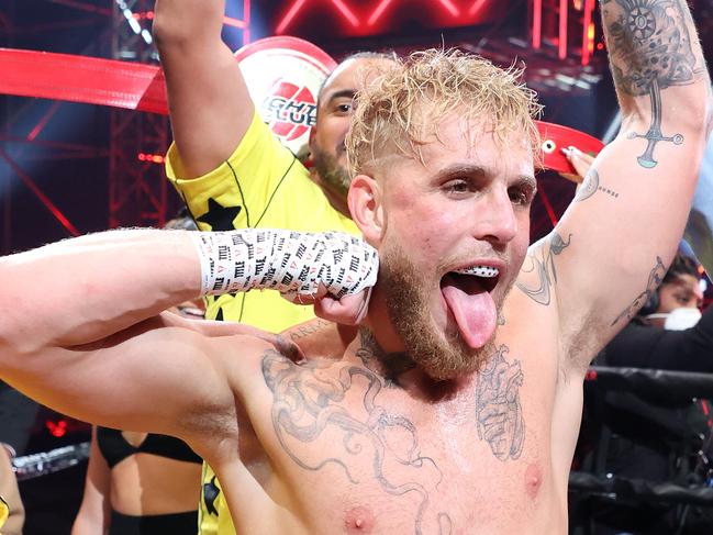 ATLANTA, GEORGIA - APRIL 17: Jake Paul celebrates after defeating Ben Askren in their cruiserweight bout during Triller Fight Club at Mercedes-Benz Stadium on April 17, 2021 in Atlanta, Georgia. (Photo by Al Bello/Getty Images for Triller)