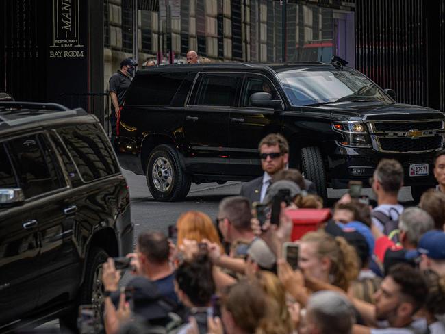 A vehicle carrying former US President Donald Trump has he leaves the office of the New York Attorney General in New York City on August 10, 2022. Picture: AFP