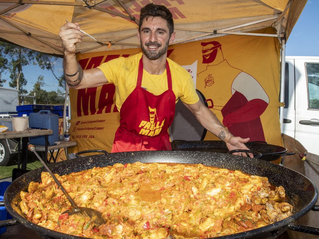 Alex Saporta the "Paella Man" creates a taste sensation in a dish at the Toowoomba Street Food Festival at Pittsworth. Saturday, January 29, 2022. Picture: Nev Madsen.