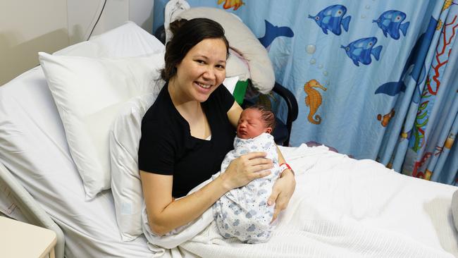 Lester Vaele, pictured with his mother Juvaine Lynn, was born in the middle of Tropical Cyclone Jasper, at 6:47am on Wednesday, December 13. He was one of nine babies, seven boys and two girls, born at the Cairns Hospital's maternity ward over a 26 hour period as Tropical Cyclone Jasper approached the Far North Queensland Coast. Picture: Brendan Radke