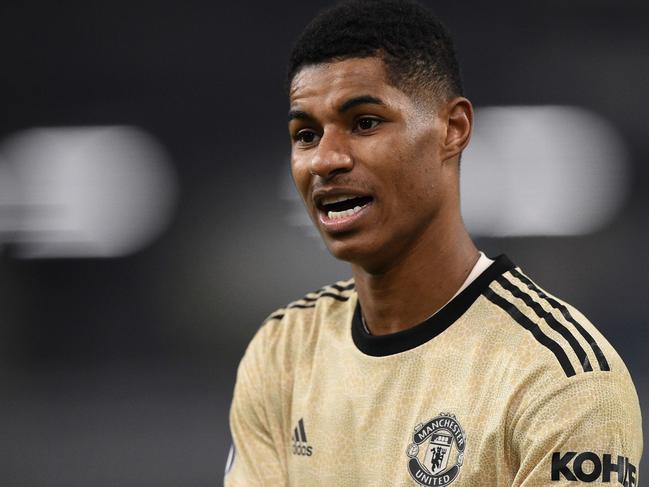 (FILES) In this file photo taken on December 28, 2019 Manchester United's English striker Marcus Rashford leaves the pitch at the end of the English Premier League football match between Burnley and Manchester United at Turf Moor in Burnley, north west England. - Manchester United striker Marcus Rashford fears society is 