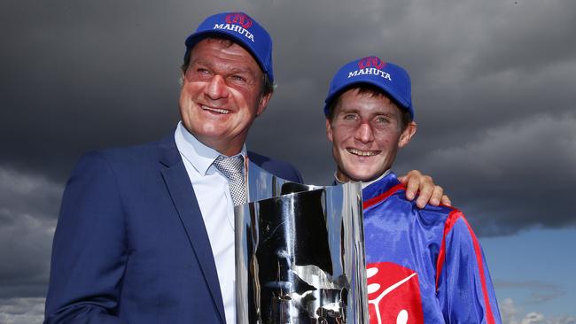 Trainer Darren Weir and his loyal lieutenant Brad Rawiller with another trophy last year. Picture: Colleen Petch