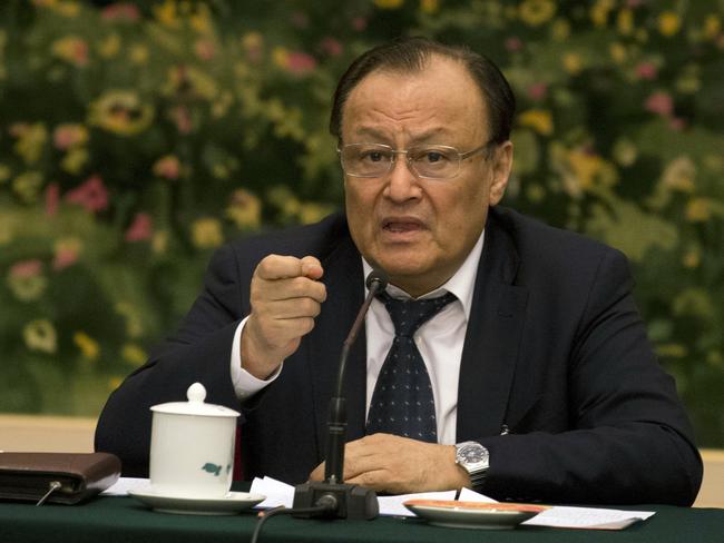 FILE - In this March 12, 2017, file photo, Shohrat Zakir, chairman of the Xinjiang Uyghur Autonomous Region, speaks on the sideline of the National People's Congress in Beijing, China. The senior Chinese official is describing the mass internment of ethnic minority Muslims in the countryâ€™s far west as a system of training centers that saves Muslims from religious extremism by teaching them to speak Mandarin and accept modern science.  It was a rare instance of the ruling Communist Party publicly detailing its vision of what the extrajudicial detention of an estimated 1 million ethnic minority Uighur and Kazakh Muslims is setting out to achieve. (AP Photo/Ng Han Guan, File)