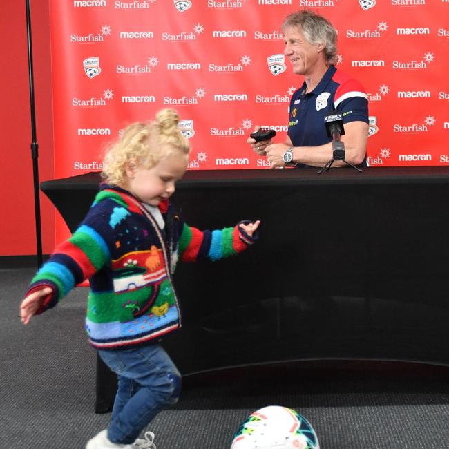 Adelaide United coach Gertjan Verbeek and daughter Senne who turns three on Sunday. (AAP Image/David Mariuz)