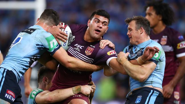 David Fifita looks to break through the tackle. Picture: Cameron Spencer/Getty Images