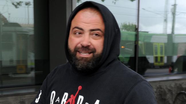 Feared crime figure Nabil Maghnie, pictured outside Melbourne West police station in November, had links with the Comanchero motorcycle gang. Picture: Andrew Henshaw