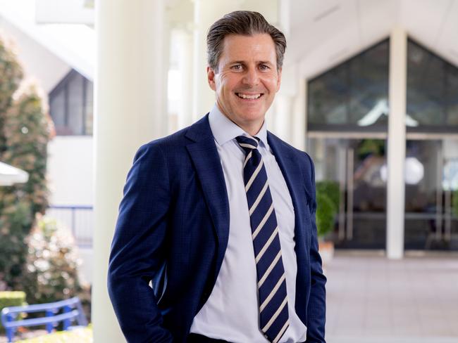 New All Saints Anglican School headmaster Matthew Corbett with students of the Gold Coast school. Picture: Luke Marsden