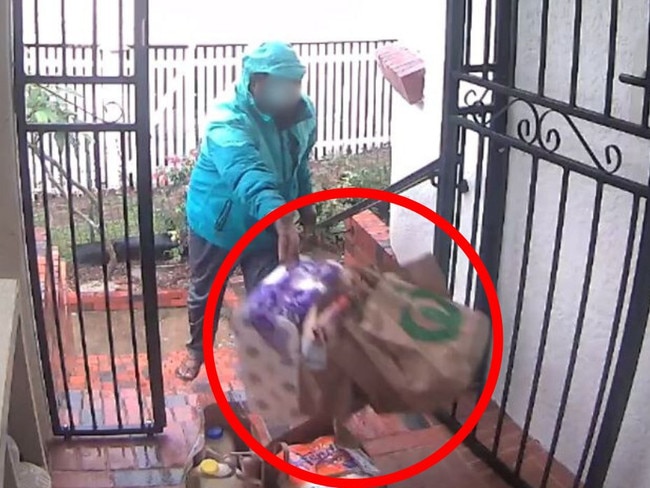 A delivery driver has been seen carelessly throwing a Woolworths delivery order on a customer's front doorstep. Picture: Reddit