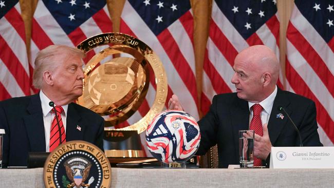Trump wants Russia back in the FIFA fold. (Photo by Jim WATSON / AFP)