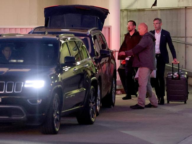 Premier Dominic Perrottet was whisked away through a private airport exit when he landed in Sydney on Saturday night. Picture: Damian Shaw