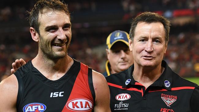 Jobe Watson (left) and coach John Worsfold after an Essendon win. Picture: AAP Images