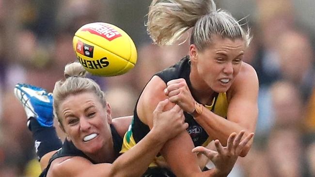 MELBOURNE, AUSTRALIA - FEBRUARY 7: Katie Brennan of the Tigers is tackled by Katie Loynes of the Blues during the 2020 AFLW Round 01 match between the Richmond Tigers and the Carlton Blues at Ikon Park on February 7, 2020 in Melbourne, Australia. (Photo by Michael Willson/AFL Photos via Getty Images) *** BESTPIX ***