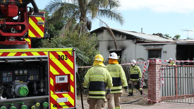 Firefighters had a difficult time rescuing a mother and son due to bars on the windows and locks on the doors. Picture Dean Martin