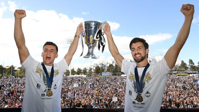 Nick, left, and Josh Daicos hold the cup aloft. Picture: Getty Images