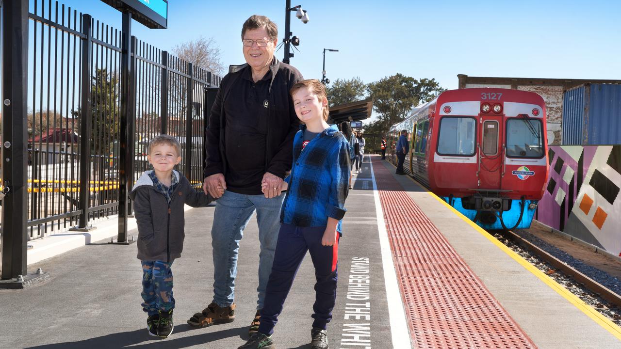 Former freight train driver Bruce Domagalski, 72, of Parafield Gardens, with grandson, Stanley, 4, and family friend Jacob Webb, 10, were there for the celebration. Picture: Dean Martin