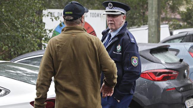 Police and emergency services workers at the Mount Wilson RFS headquarters yesterday. Picture: Adam Yip